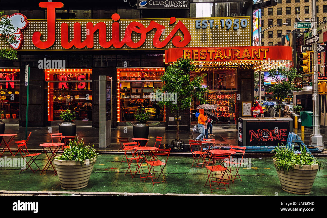 New York City, USA, May 2019, view of the Junior`s restaurant facade on Broadway on a rainy day Stock Photo